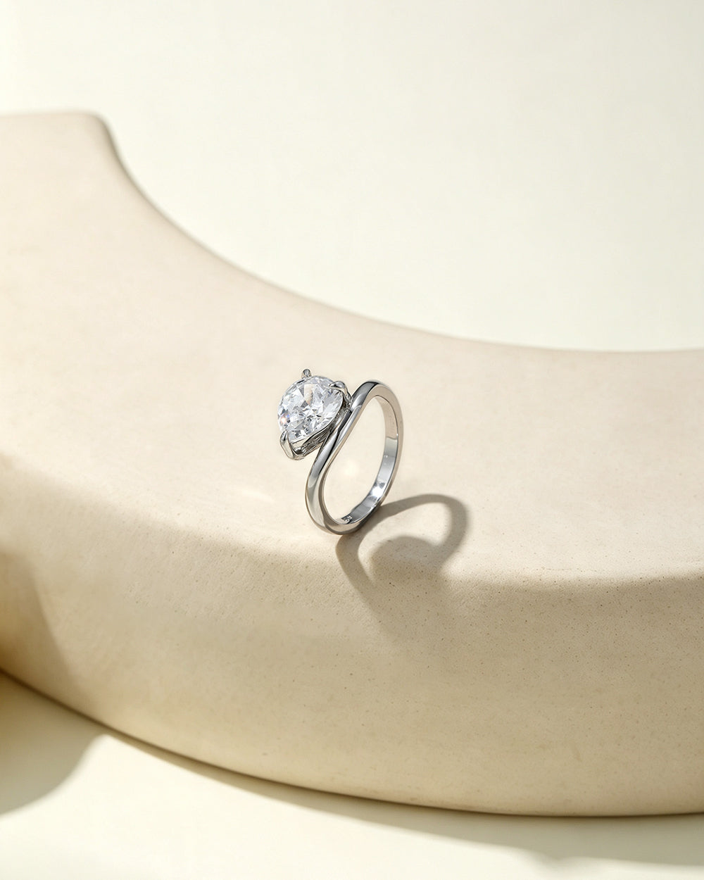 Rhodium Plated Water Drop Twist CZ Ring