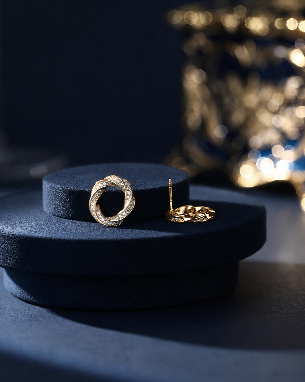 18K gold-plated diamond-encrusted twisted hoop earrings