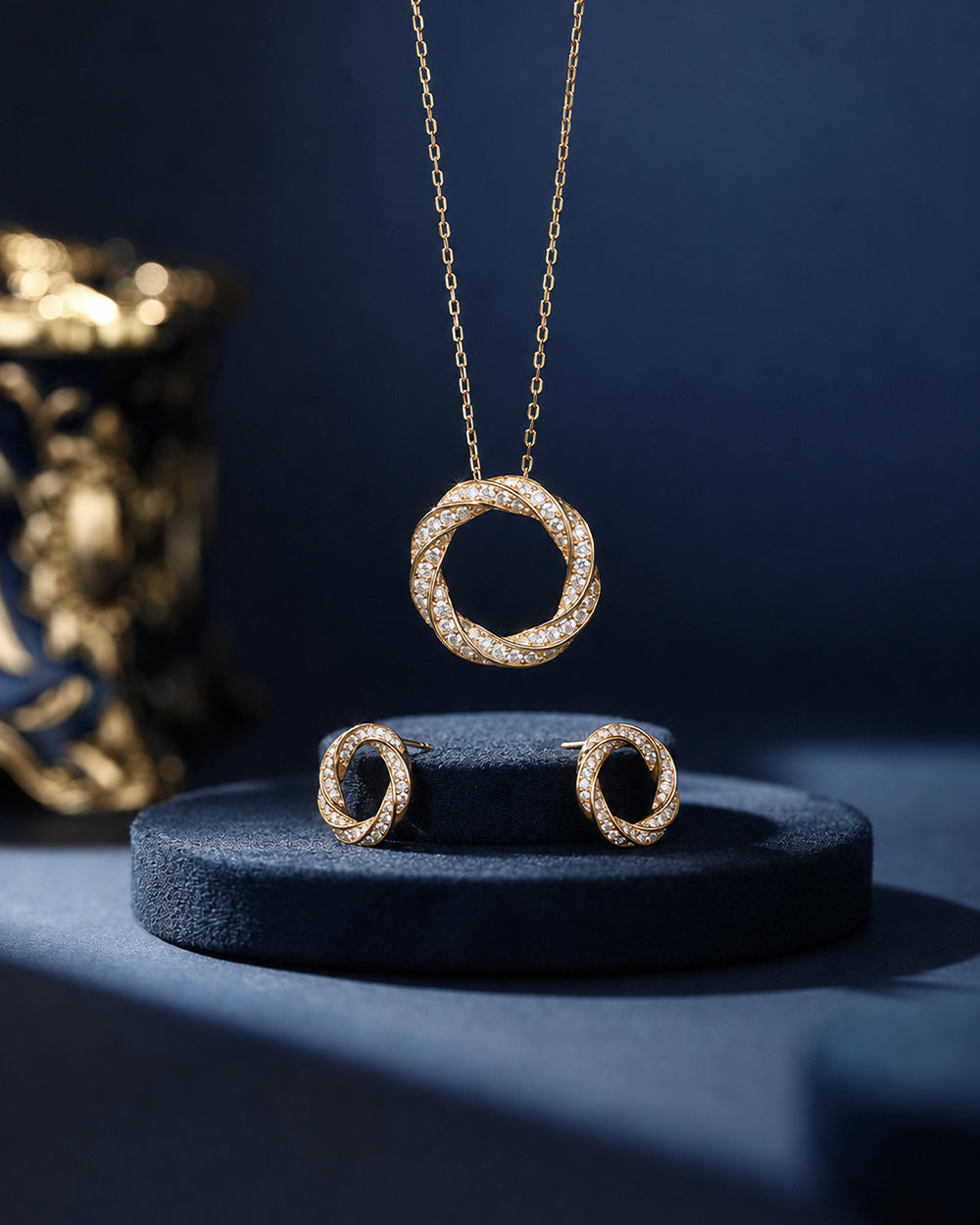 18K gold-plated diamond-encrusted twisted hoop earrings